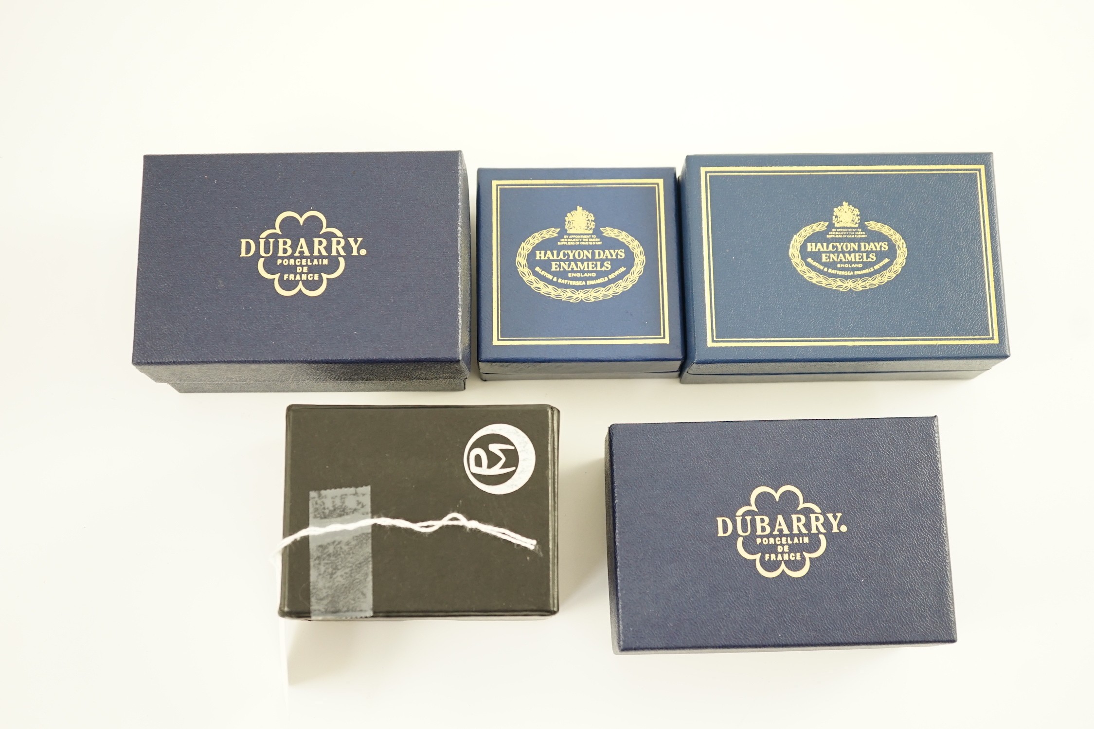 Two Halcyon Days enamel boxes; frog and 1991, two Dubarry boxes and a white metal model elephant, all boxed.